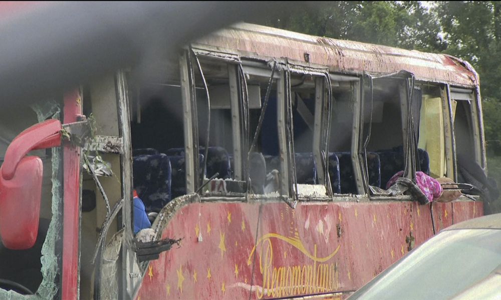 A damaged bus is shown after several people were killed and dozens injured after the commercial bus overturned on Interstate 20 early Saturday, Aug. 31 2024 in Warren County, Miss., according to the Mississippi Highway Patrol. (WAPT via AP)