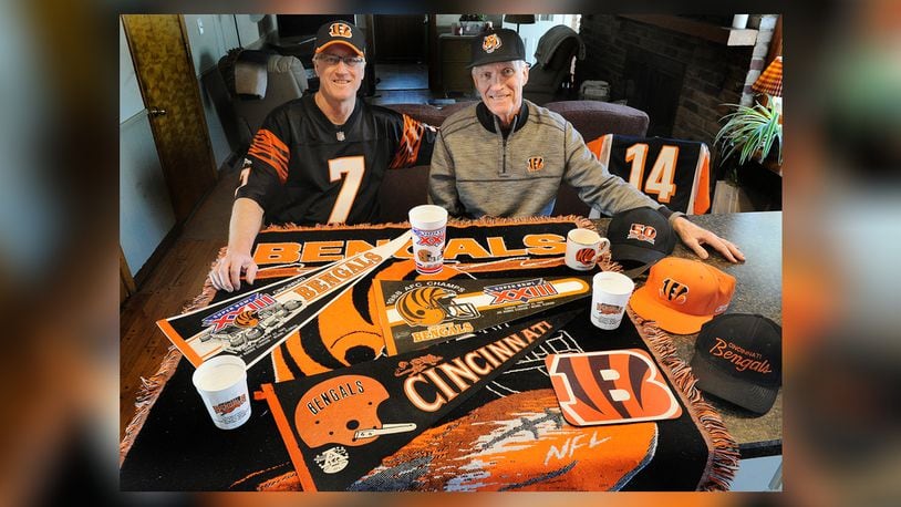 John Kavanaugh, left and his brother Tom, are lifelong Bengal fans, they are traveling to California to watch the Bengals take on the Rams. MARSHALL GORBY\STAFF