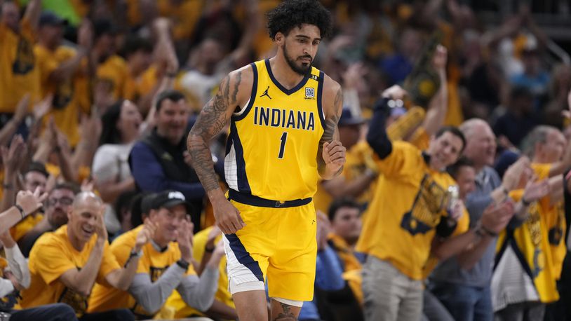 Indiana Pacers forward Obi Toppin (1) celebrates after making a basket during the first half of Game 4 of the NBA Eastern Conference basketball finals against the Boston Celtics, Monday, May 27, 2024, in Indianapolis. (AP Photo/Michael Conroy)