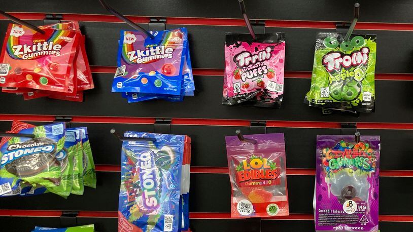 An array of products advertised as containing synthetically derived delta-8 THC is offered for sale at a smoke shop in north Seattle on Friday, Feb. 25, 2022. (AP Photo/Gene Johnson)