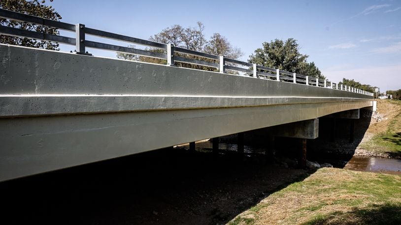 The Lamme Road bridge over Holes Creek on the Moraine-Miami Twp. border has been replaced, and the road reopened Friday, Oct. 13, 2023. Jim Noelker/Staff