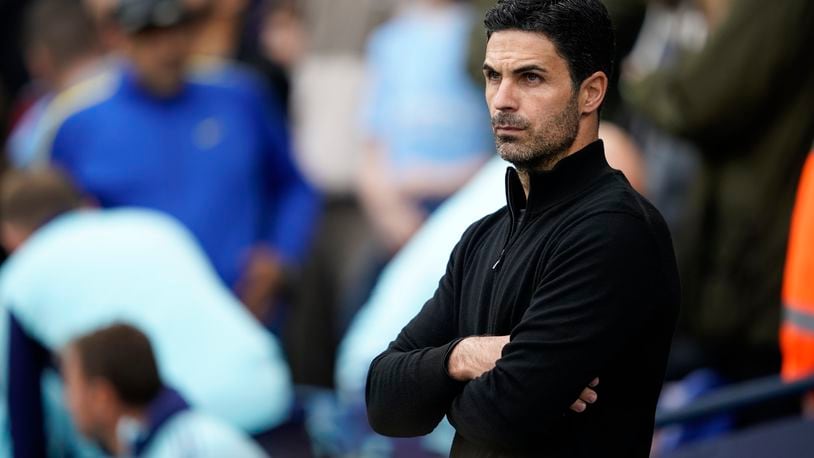 Arsenal's manager Mikel Arteta stands on the touchline before the English Premier League soccer match between Manchester City and Arsenal at the Etihad stadium in Manchester, England, Sunday, Sept. 22, 2024. (AP Photo/Dave Thompson)