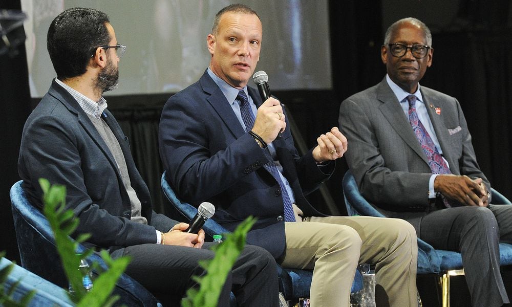 Panelists answered questions at the Dayton Development Coalition's annual meeting Wednesday, Feb. 7, 2024, Panelists were from left, Didier Papadapoulos, head of aircraft OEM for Joby Aviation, Inc., Jon Piatt, executive vice president for ISR, aviation & security at Sierra Nevada Corp. and retired U.S. Air Force Gen. Lester L. Lyles. The event was held at the National Museum of the U. S. Air Force. MARSHALL GORBY\STAFF