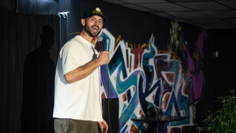 Comedian Henry Allen performs at the Jokes & Tokes Comedy Club. Photo by Eric Boso