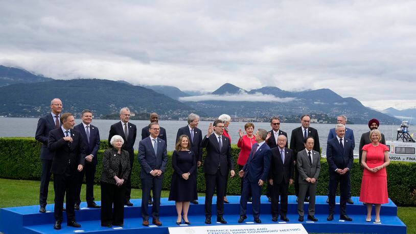 Finance Ministers and Central Bank Governors pose for the family picture at the G7 Finance Ministers meeting in Stresa, northern Italy, Friday, May 24, 2024. (AP Photo/Antonio Calanni)