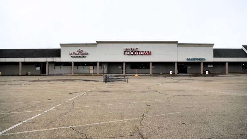 The Tipp Plaza has been the target of complaints about the condition of its parking lot and vacant spaces, including a former grocery store. CONTRIBUTED