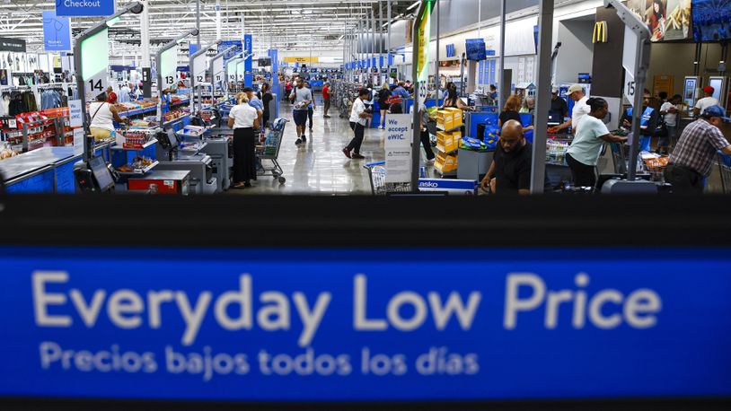 FILE - Customers use self check out at a Walmart Superstore in Secaucus, New Jersey, July 11, 2024. (AP Photo/Eduardo Munoz Alvarez, File)