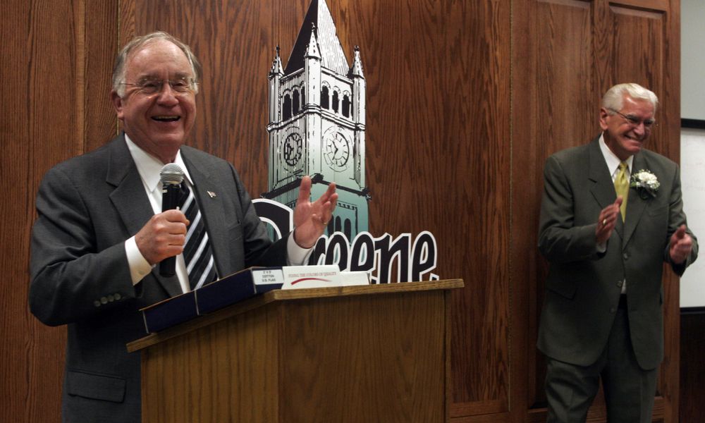 Retiring Congressman Dave Hobson draws a laugh from retiring Greene County Commissioner Ralph Harper at Harper's retirement party.