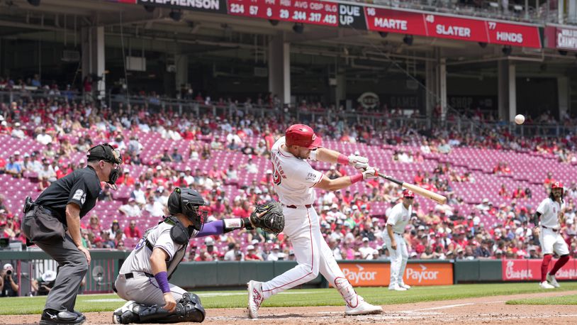 Cincinnati Reds' Tyler Stephenson (37) hits a three-run home run during the third inning of a baseball game against the Colorado Rockies, Thursday, July 11, 2024, in Cincinnati. (AP Photo/Jeff Dean)