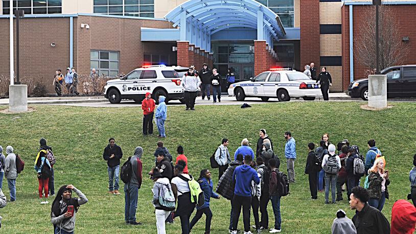 Many Belmont High School students evacuated the building March 7 after rumors circulated that another student was inside with a gun. Police said a student had made threats but they took him into custody earlier that day away from school. MARSHALL GORBY / STAFF