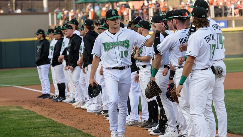 The Dayton Dragons played their home opener on Tuesday, Apr. 11, 2023 at Day Air Ballpark in downtown Dayton to a sellout crowd of 8,135, extending the team’s streak to 1,442 games, an all-time record for professional sports franchises. The Dragons lost to the Great Lakes Loons 9-7. Did we spot you there? TOM GILLIAM/CONTRIBUTING PHOTOGRAPHER