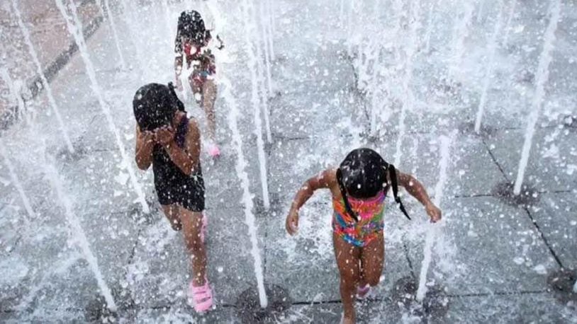 There are seven splash pads at parks in Dayton, open daily from noon to 8 p.m. STAFF FILE