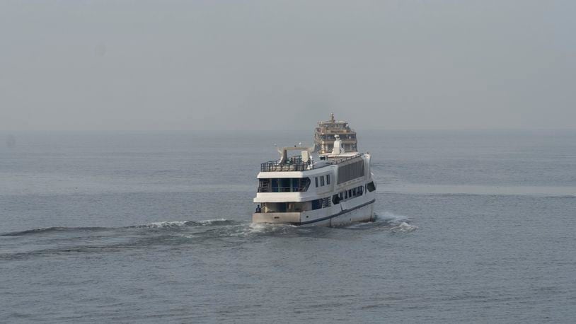 A ferry leaves Goma, the Democratic Republic of Congo, Sunday, Oct. 6, 2024, for Bukavu on lake Kivu. (AP Photo/Justin Kabumba)