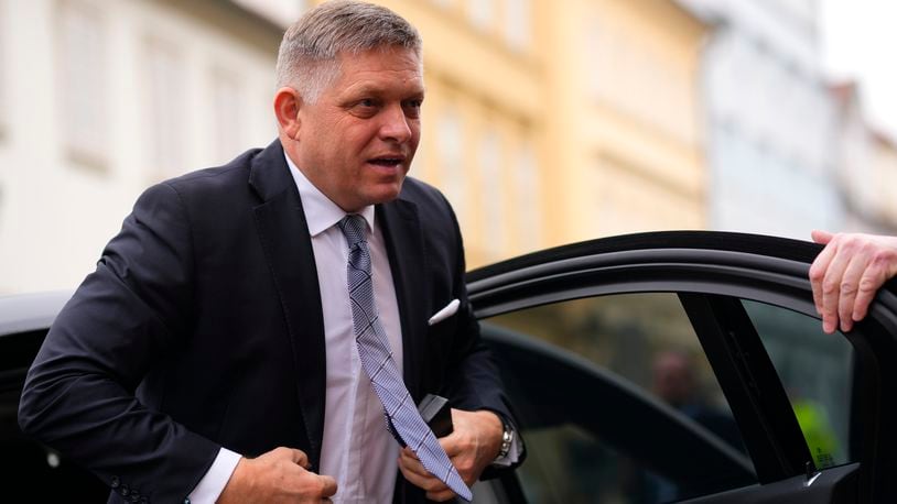 FILE - Slovakia's Prime Minister Robert Fico arrives for the V4 meeting in Prague, Czech Republic, Tuesday, Feb. 27, 2024. Slovakia’s parliament voted on Thursday, June 20, 2024 to approve a government plan to overhaul the country’s public radio and television services, a move that critics say would result in the government taking full control of the media. (AP Photo/Petr David Josek, File)