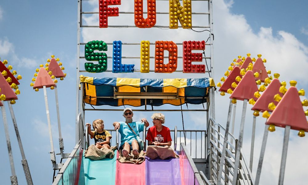 Montgomery County fairgoers ride the fun slide. The fair returns July 7-13, 2024. JIM NOELKER/STAFF