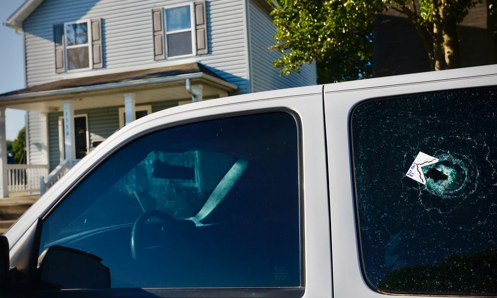 Multiple people were taken to the hospital following a shooting in Dayton on Home Avenue near South Euclid Avenue early Monday, June 24, 2024. Several vehicles, including this truck, have bullet holes from the shooting. MARSHALL GORBY \STAFF