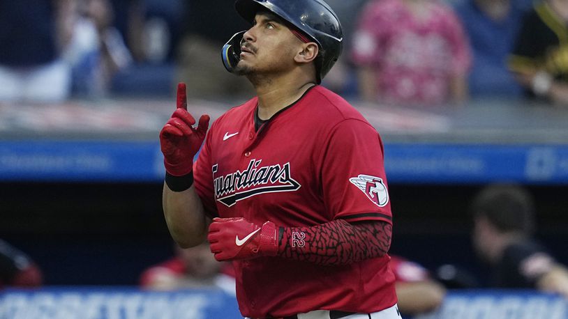 Cleveland Guardians' Josh Naylor gestures as he runs to home plate on a home run during the fifth inning of the team's baseball game against the Seattle Mariners, Wednesday, June 19, 2024, in Cleveland. (AP Photo/Sue Ogrocki)