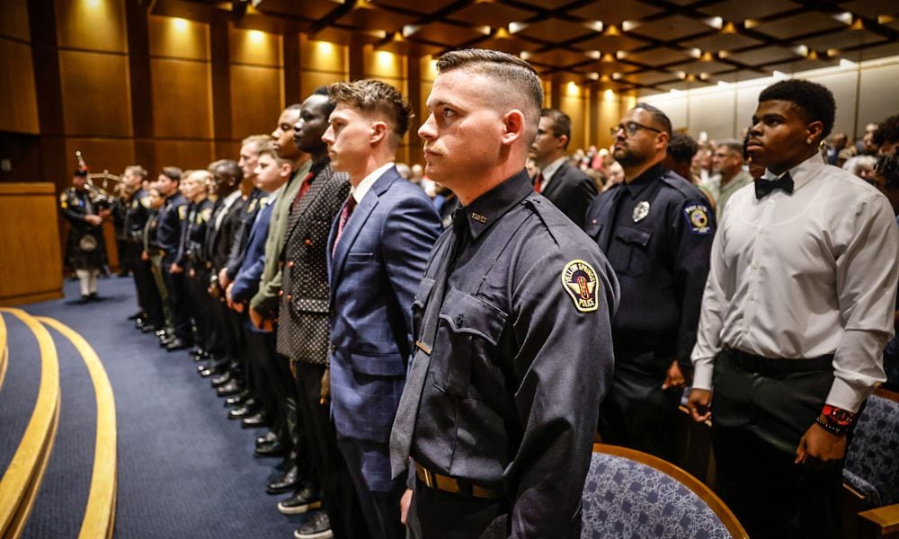 Sinclair Community College's Criminal Justice Training Academy graduation ceremony was held June 12 at Sinclair College. 19 students graduated in law enforcement and corrections. JIM NOELKER/STAFF