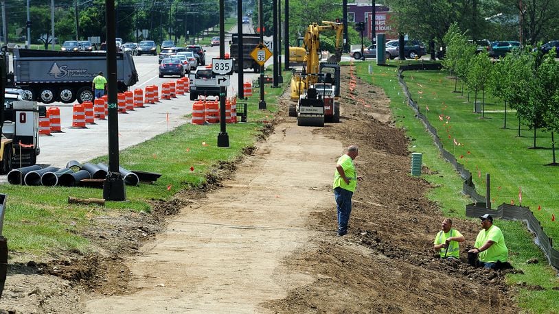 Construction has started on a new Kettering Miami Valley Research Park bike path connector that will help provide links to Centerville and Dayton. This is the north side of Research Boulevard between Woodman Drive and College Drive. MARSHALL GORBY\STAFF