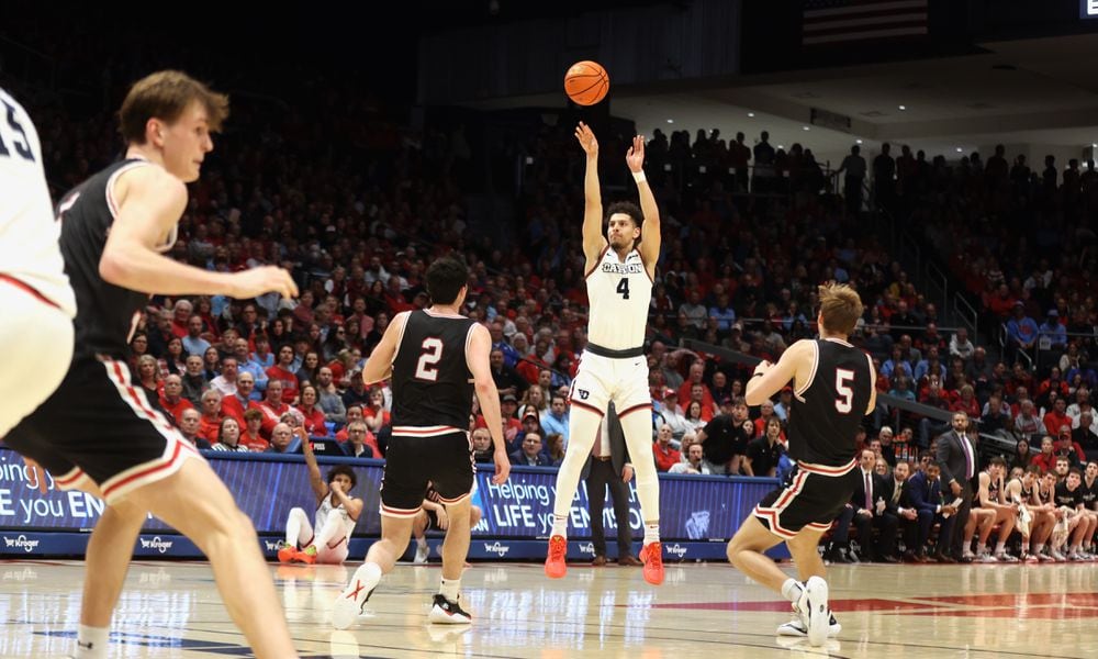 Dayton's Koby Brea shoots against Davidson on Tuesday, Feb. 27, 2024, at UD Arena. David Jablonski/Staff