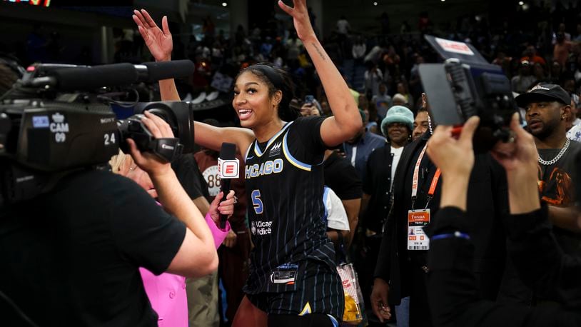Chicago Sky forward Angel Reese (5) is interviewed by Holly Rowe after the Sky defeated the Indiana Fever, 88-87, in a WNBA basketball game, Sunday, June 23, 2024, in Chicago. (Eileen T. Meslar/Chicago Tribune via AP)