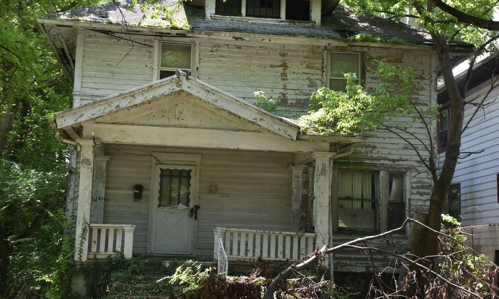 A dilapidated home in the Southern Dayton View neighborhood in northwest Dayton. The neighborhood had the highest concentration of housing with poor condition grades in the city. CORNELIUS FROLIK / STAFF