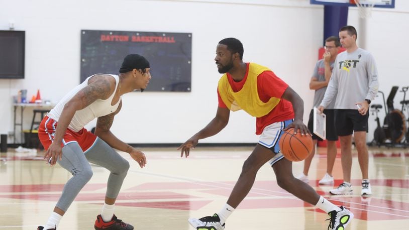 Former Flyers Darrell Davis, left, and Scoochie Smith practice with the Red Scare for The Basketball Tournament on Tuesday, July 16, 2024, at the Cronin Center in Dayton. David Jablonski/Staff