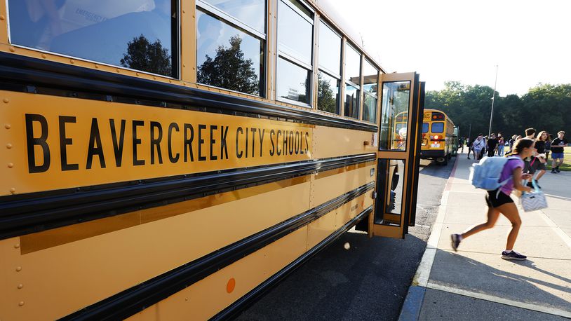 Students arrive Wednesday, Aug. 14, 2024 for the first day of school at Beavercreek High School. MARSHALL GORBY\STAFF