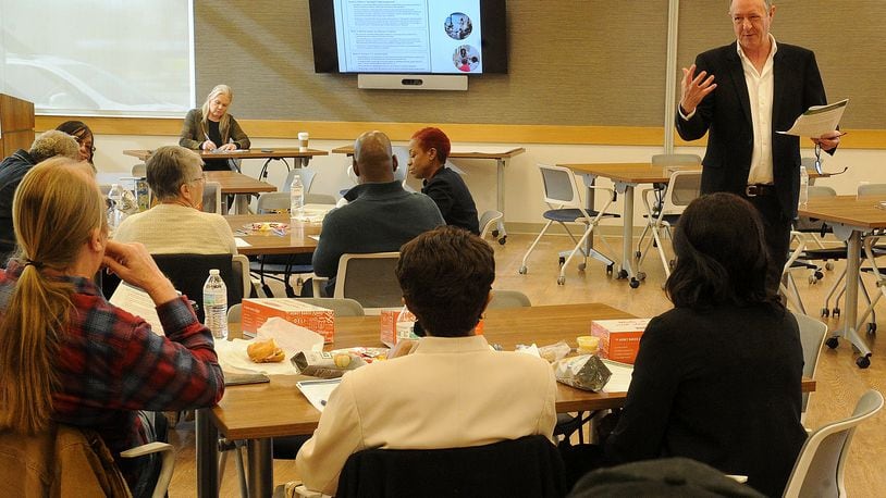 Future iQ CEO David Beurle speaks Monday about the company's collaboration with the city of Trotwood in a meeting held at the Goodwill Easterseals West Campus. MARSHALL GORBY\STAFF