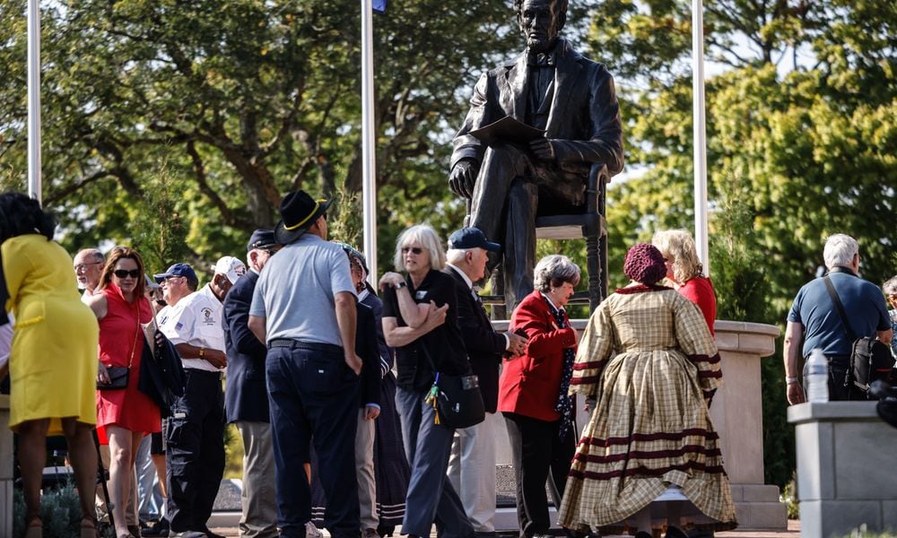 Hundreds of people watched the unveiling of the Lincoln statue at the Dayton VA Medical Center Monday September 16, 2024. Jim Noelker/Staff