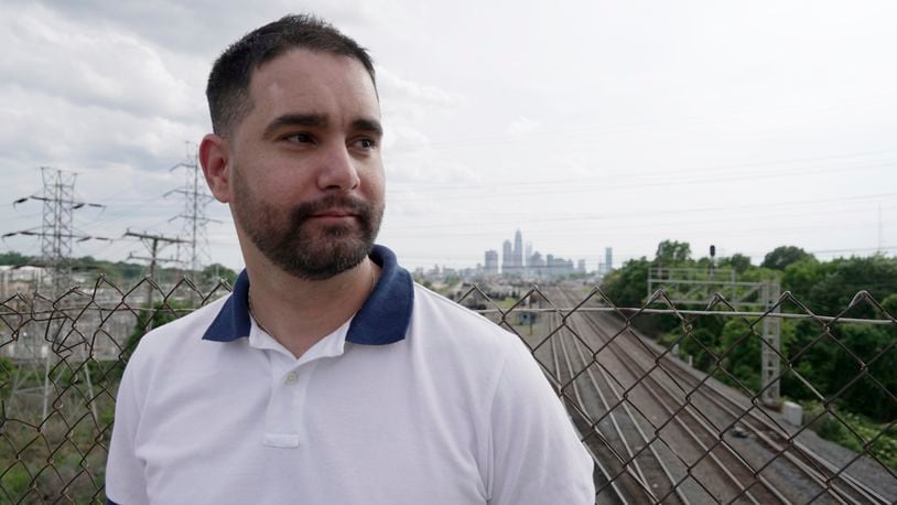 Fernando Hermida, who has moved several times to access HIV treatment, stands for a portrait in Charlotte, N.C., on May 26, 2024. (AP Photo/Laura Bargfeld)