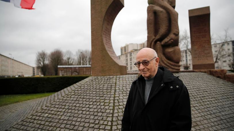 FILE - Victor Perahia, who was interned as a child in the Drancy camp and deported to Bergen-Belsen speaks to students during a workshop dedicated to the Holocaust remembrance at the Drancy Shoah memorial, outside Paris, Thursday Jan. 30, 2020. Victor Perahia, the president of the French Union of Auschwitz Deportees and a Holocaust survivor, has died. He was 91. (AP Photo/Christophe Ena, File)