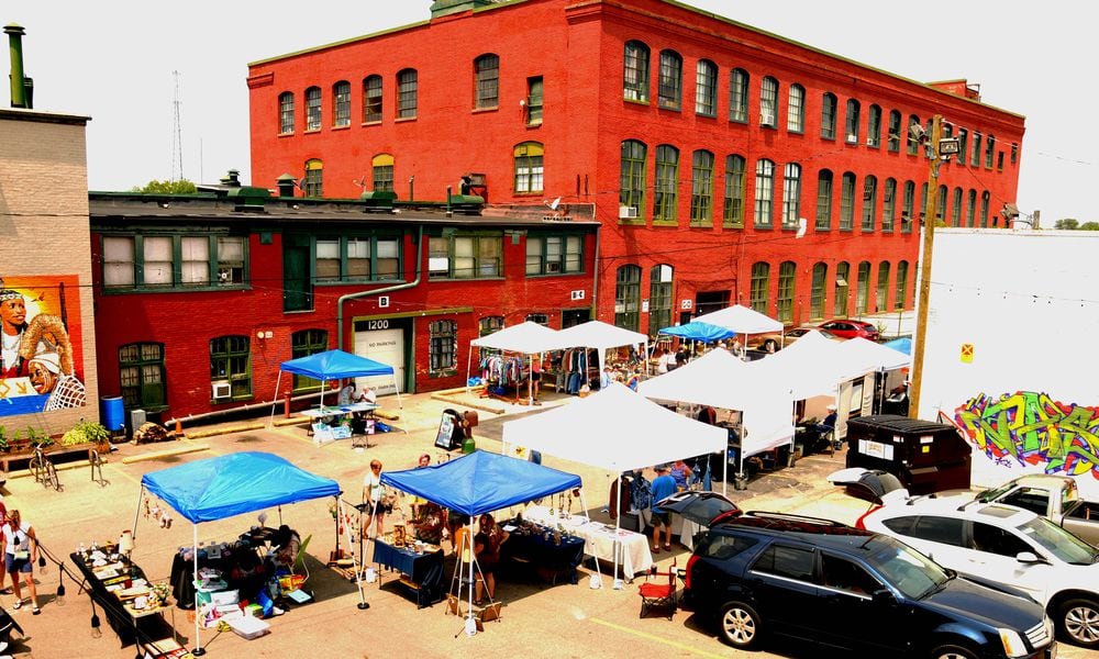 Dayton's art district on Front Street hosted a Father's Day Art Hop and Beer Garden on Sunday, June 18. Over 250 artists and vendors opened their studios and shops for the third annual event. Local food trucks and Fifth Street Brew Pub supplied the food and beer for the visitors to Front Street. DAVID A. MOODIE/CONTRIBUTING PHOTOGRAPHER