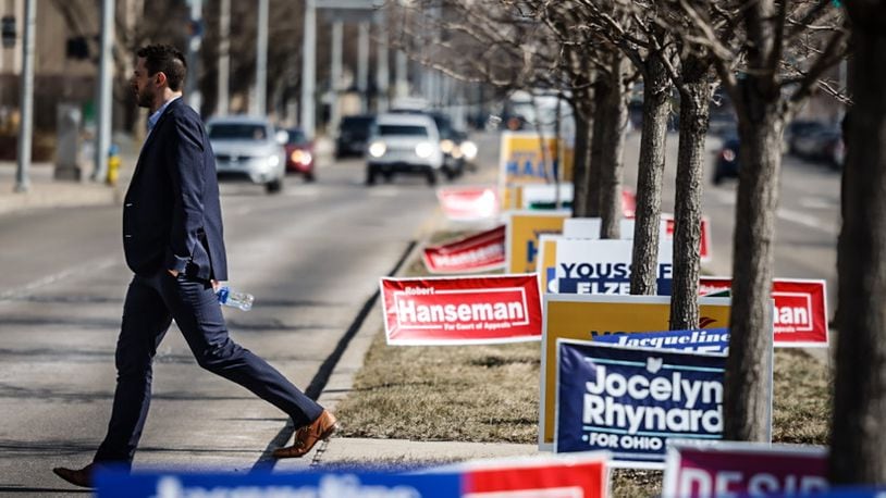 Political signs line the middle of Third Street in front of the Montgomery County Board of Elections on Wednesday Feb. 21, 2024, the first day of early voting in the March 19 election. JIM NOELKER/STAFF
