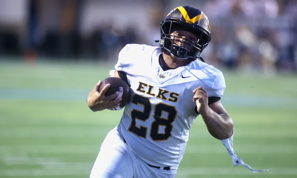 Centerville's Parker Johnson runs for a touchdown in the second quarter against Fairmont on Friday, Sept. 13, 2024, at Roush Stadium. David Jablonski/Staff