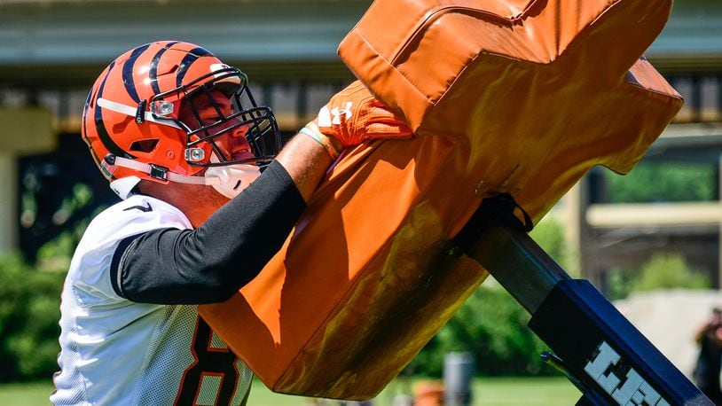 C.J. Uzomah leaves Cincinnati Bengals practice on a cart