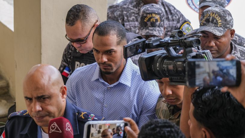 FILE - Tampa Bay Rays shortstop Wander Franco, center, is escorted by police to court in Puerto Plata, Dominican Republic, Jan. 5, 2024. Dominican prosecutors formally accused Franco on Tuesday, July 9, 2024, of sexual abuse against a 14-year-old girl. (AP Photo/Ricardo Hernandez, File)