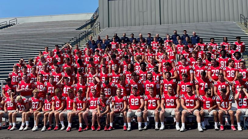 The Dayton football team poses for a photo at Welcome Stadium on Sunday, Aug. 20, 2023. David Jablonski/Staff