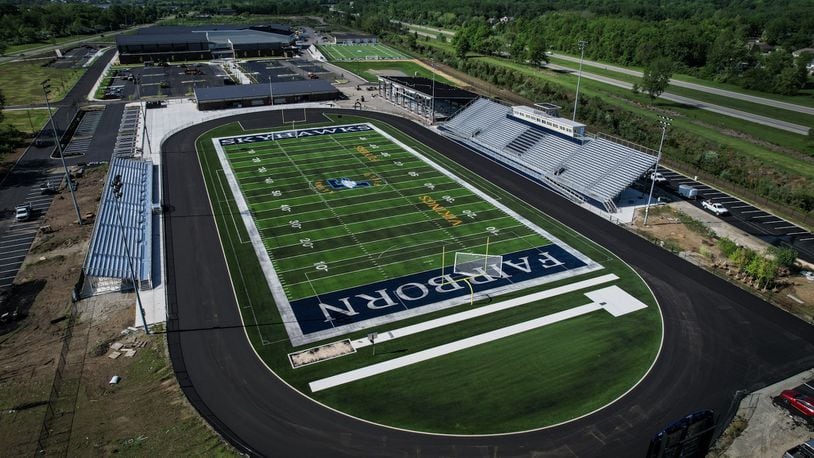 Fairborn students involved in band and sports will be using new facilities this coming school year. The new $95 million, 214,000 square foot Fairborn High School on Commerce Center Boulevard near Interstate 675 will have a 1,000-seat performing arts center, an arena that seats 2,100 and an auxiliary gym, district officials said. JIM NOELKER/STAFF