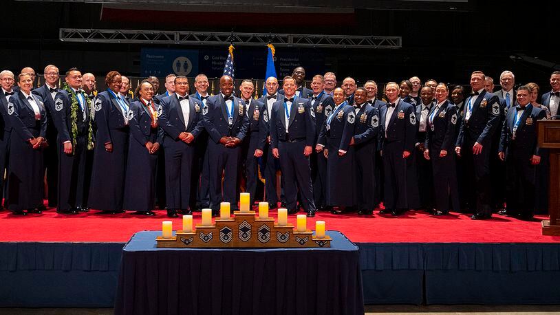 Wright-Patterson Air Force Base chief master sergeants join the 14 recently selected chiefs for a group photo at the end of the Wright-Patterson Chief Master Sergeant Recognition Ceremony on May 14 at the National Museum of the U.S. Air Force. U.S. AIR FORCE PHOTO/R.J. ORIEZ
