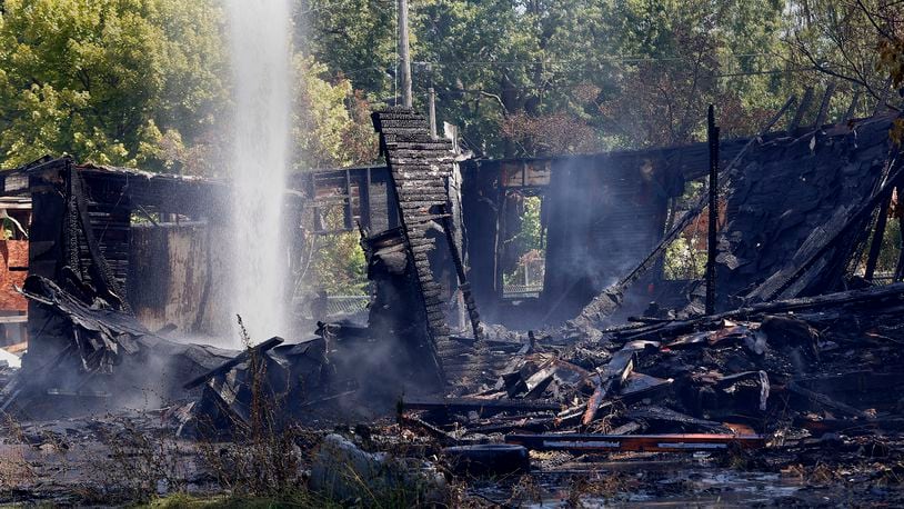 Trotwood and Dayton Fire Departments responded to a fully involved vacant house fire at 5813 Lorimer Street, Monday, Aug. 12, 2024. No injuries were reported. MARSHALL GORBY\STAFF