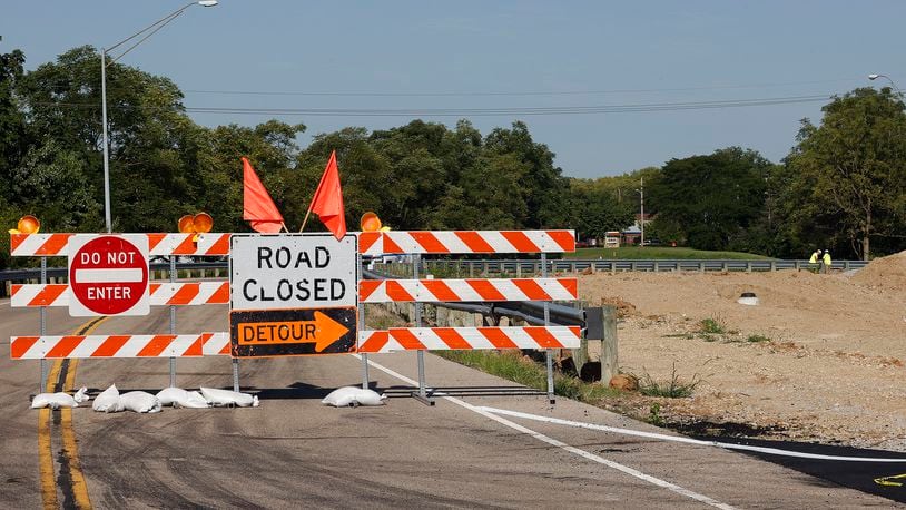 Manchester Road at E. Dixie Drive is closed in West Carrollton. Manchester Road traffic is being routed onto a temporary roadway through the old Roberds site. MARSHALL GORBY\STAFF