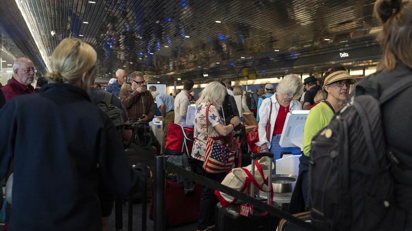 
                        Travelers wait in a long line at the Delta Airlines counter at Milwaukee Mitchell International Airport in Milwaukee on Friday, July 19, 2024. The tech outage on Friday hit airlines especially hard, and Delta has been the slowest to restore its operations. (Hiroko Masuike/The New York Times)
                      