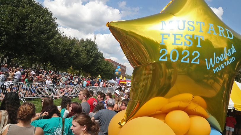 One of the highlights of MustardFEST is the Champion City Wiener Dog Races Saturday, Sept. 17, 2022 at National Road Commons Park in Springfield. BILL LACKEY/STAFF