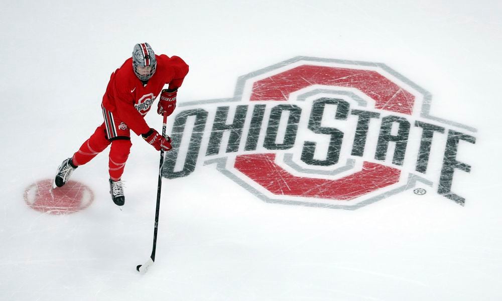 FILE - Ohio State University forward Ronnie Hein guides the puck during NCAA college hockey practice on April 4, 2018, in St. Paul. Minn. Three years into the new age of college sports, where athletes are allowed to profit from their successes through name, image and likeness deals, everyone is still trying to find out what the new normal will be. (Anthony Souffle/Star Tribune via AP, File)