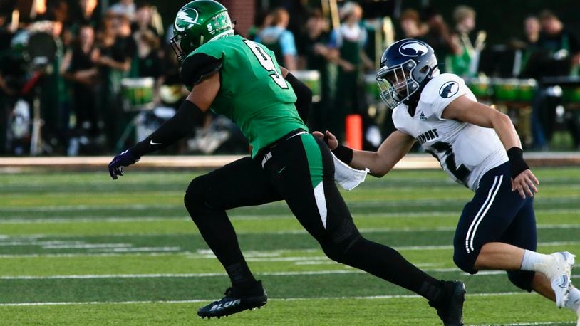 Northmont's Nigel Glover returns a fumble for a touchdown against Fairmont on Friday, Sept. 9, 2022, at Premier Health Stadium in Clayton. David Jablonski/Staff