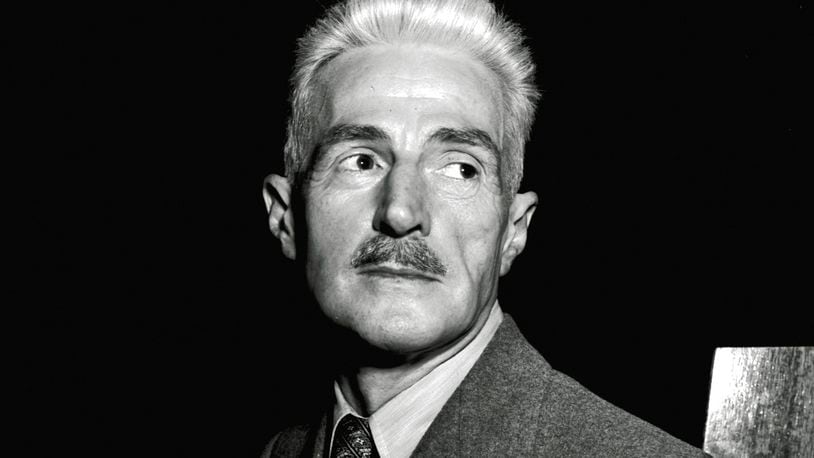 FILE - Novelist Dashiell Hammett, author of "The Maltese Falcon" appears in New York on Nov. 7, 1947. Hammett’s Sam Spade, will be continued by prize-winning crime writer Max Allan Collins. The publisher Hard Case Crime announced Thursday that Collins’ “The Return of Sam Spade” will be released in January 2026, when the Hammett classic featuring Spade, “The Maltese Falcon,” enters the public domain. (AP Photo/EF, File)