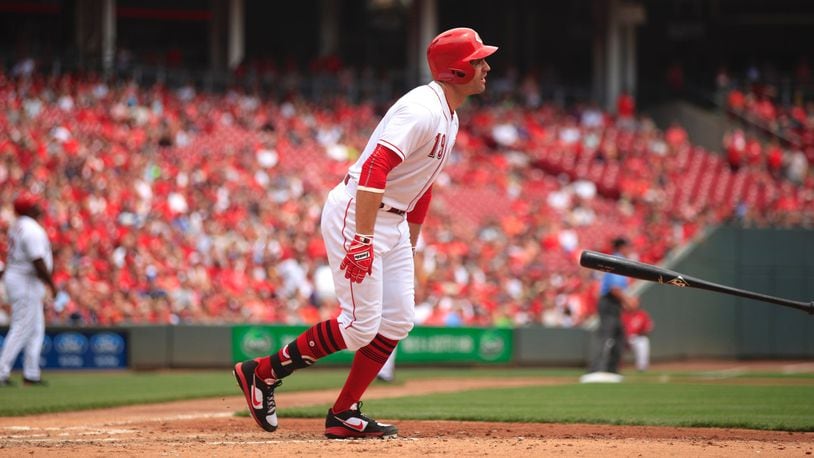 The Reds’ Joey Votto reacts after popping out with the bases loaded against the Nationals on Sunday, July 16, 2017, at Great American Ball Park in Cincinnati. David Jablonski/Staff