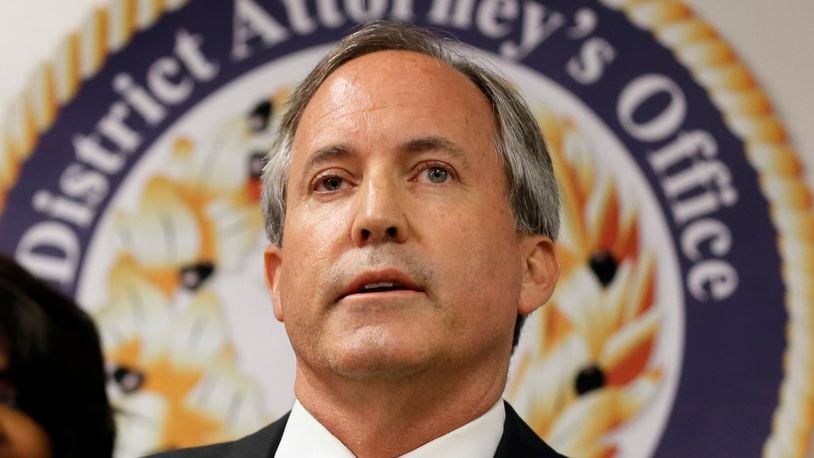 FILE - Texas Attorney General Ken Paxton speaks at a news conference in Dallas on June 22, 2017. (AP Photo/Tony Gutierrez, File)