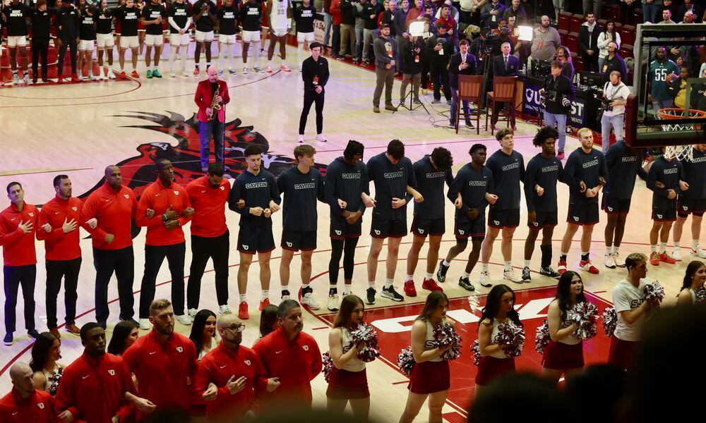 Dayton stands for the national anthem before a game against Saint Josephs on Tuesday, Feb. 6, 2024, at Hagan Arena in Philadelphia. David Jablonski/Staff